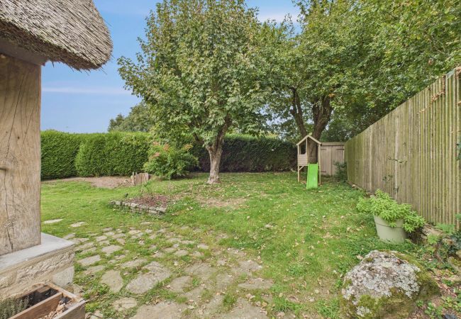 Ferienhaus in Baden - Wunderschönes Reetdachhaus für 6 mit Garten Ferienhaus in Baden - Wunderschönes Reetdachhaus für 6 mit Garten